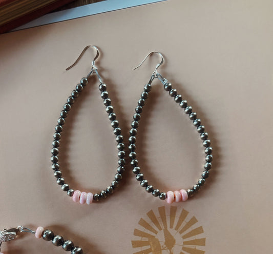 Sterling silver pink conch earrings